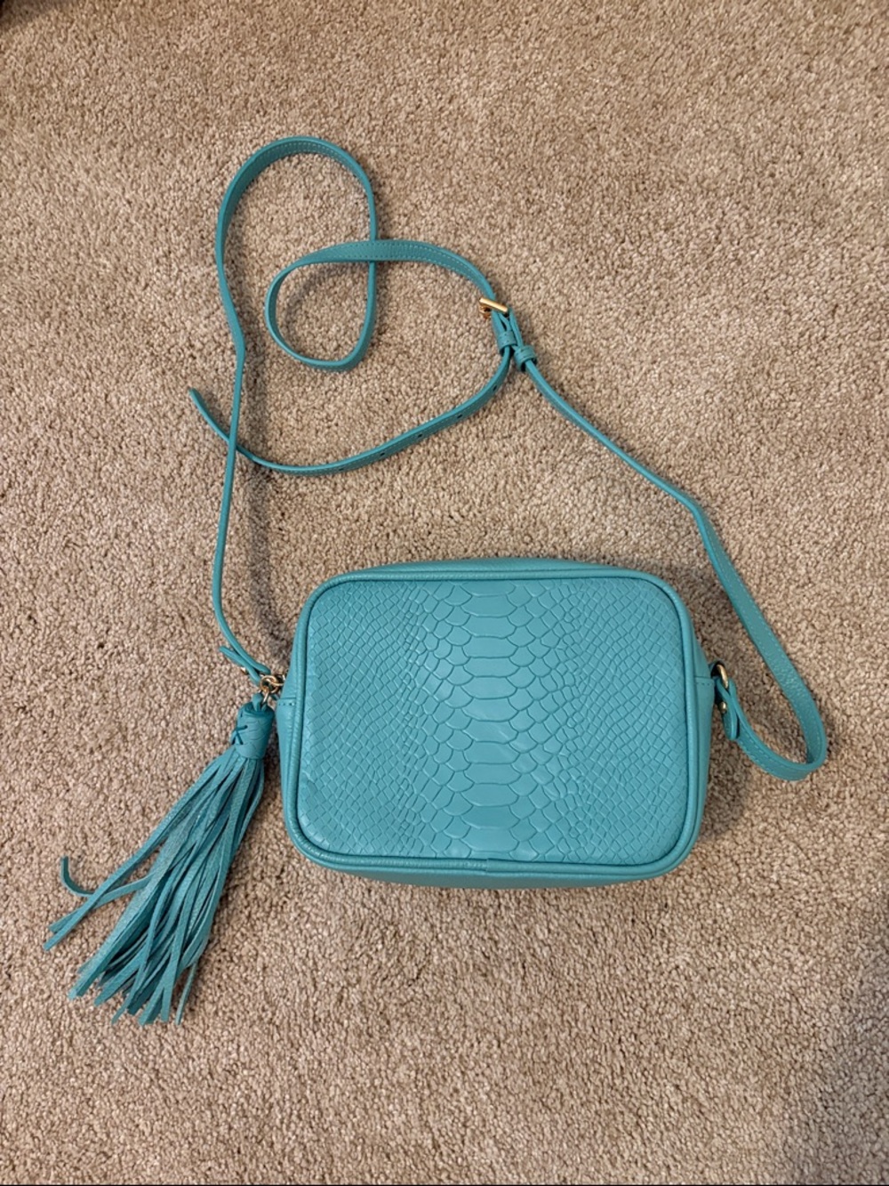 Textured Turquoise Crossbody Bag with Tassel Accent - Picture 2 of 7
